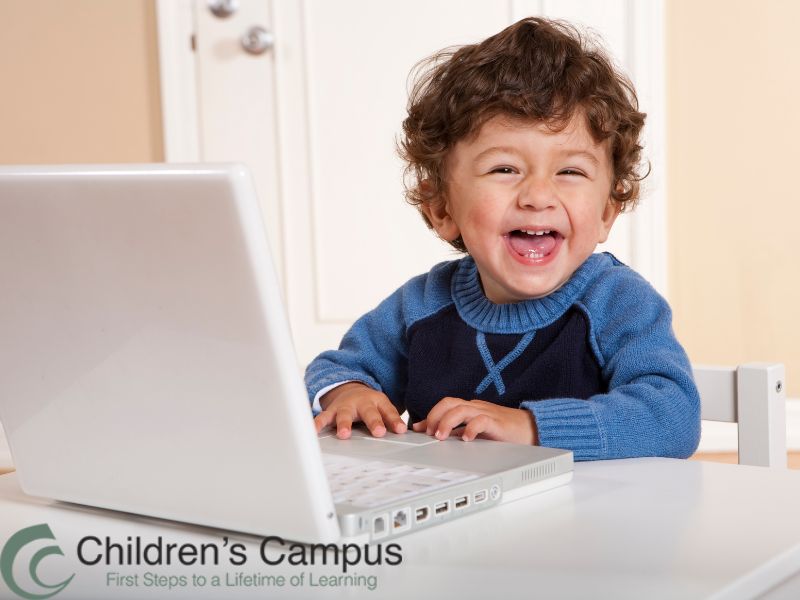 Young student learning early technology and problem-solving at Children’s Campus STEM preschool in Greenville.